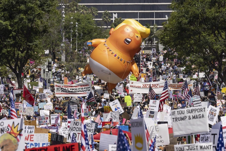 The Parade That Broke America? Trump’s Bold Move Draws Global Attention as Protests Erupt 2 Trump holds military parade in Washington as millions protest