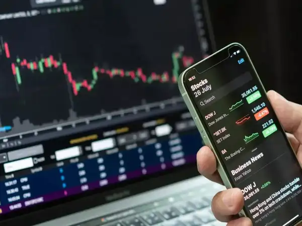 US stocks end mixed, with Dow up after Senate passes tax bill
